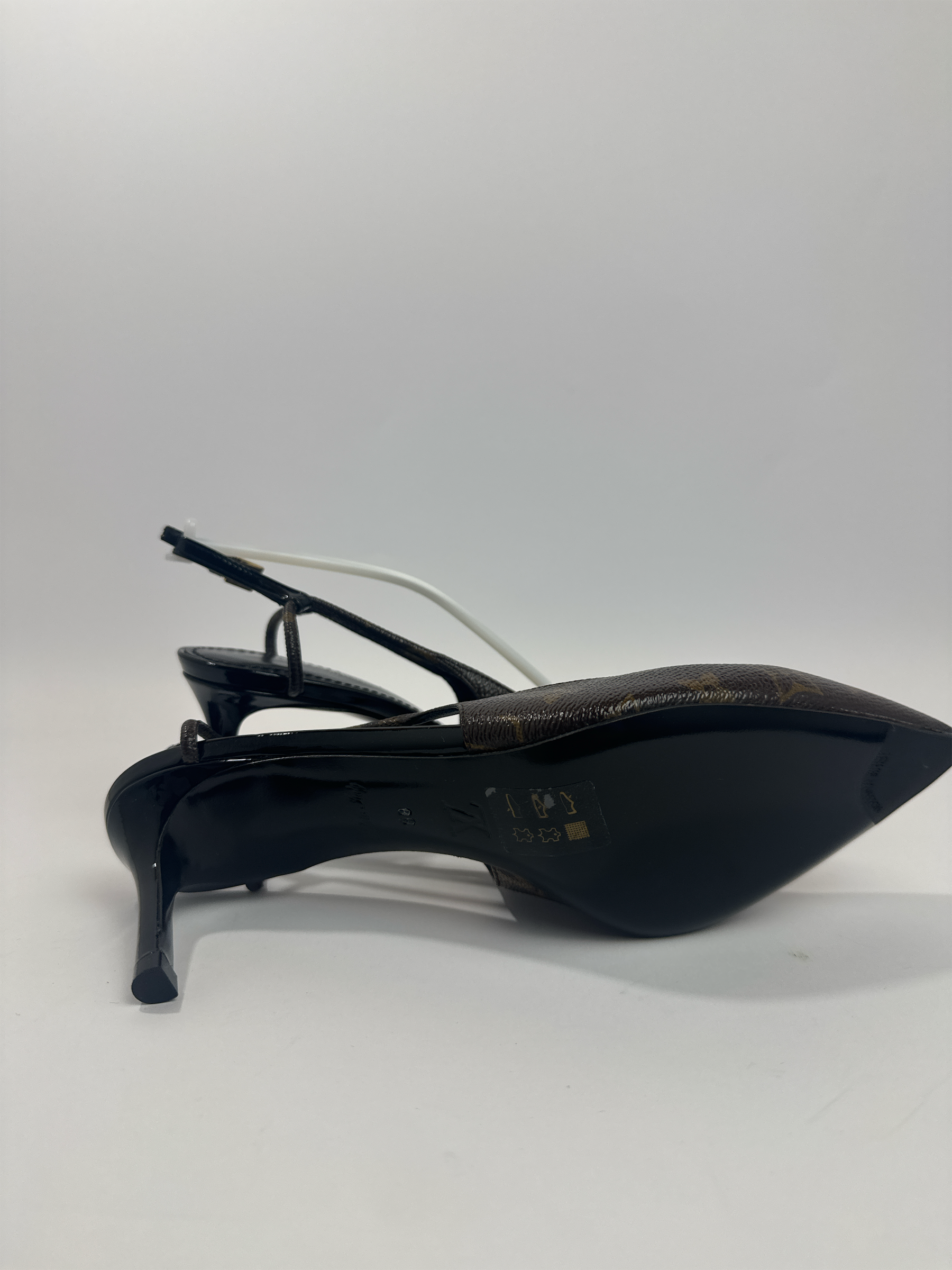 VDS 2 HAND brown monogram coated canvas slingback heels with black patent leather trim and stiletto heel.